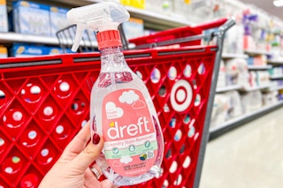 Dreft Stain Remover Spray held in front of Target shopping cart