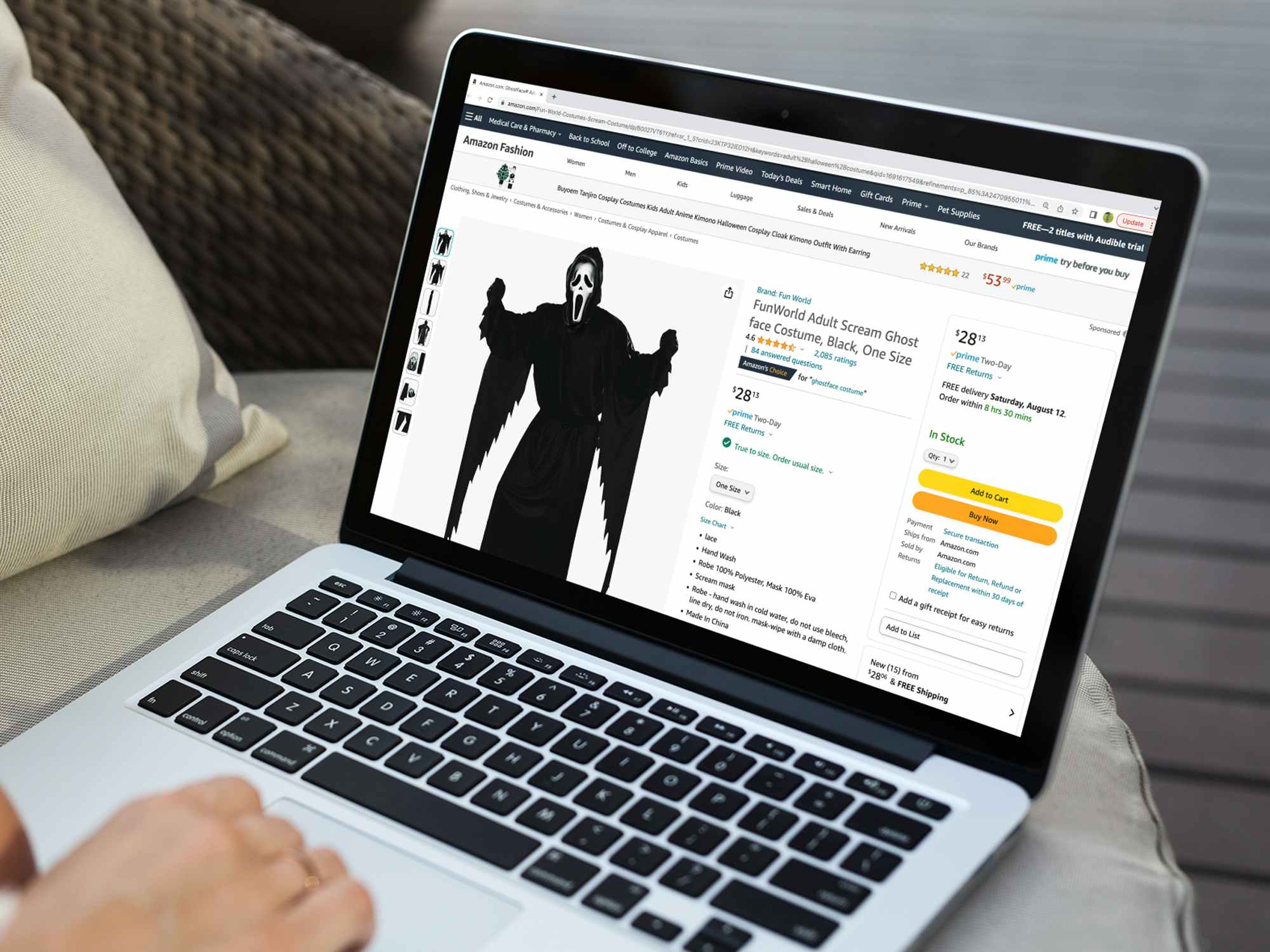 a person looking at amazon halloween costumes on their macbook