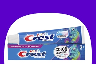 crest advanced kids toothpaste on blue and white background