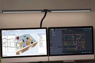 Pzloz Led Desk Lamp illuminating two Mac monitors on a desk.