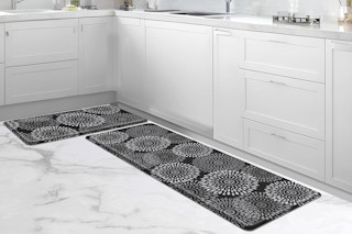 black anti-fatigue mat set on kitchen floor