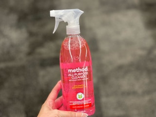 method spray held in hand