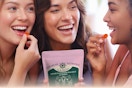 women eating a feminine balance gummies
