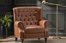 a brown faux leather recliner chair 