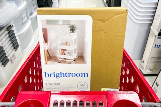 a white utility cart in a red Target cart