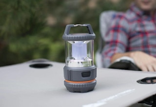 Ozark Trail LED lantern on a camping table