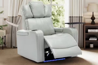 Lifestyle image of the gray PU leather Merax power recliner with LED lights in home setiing