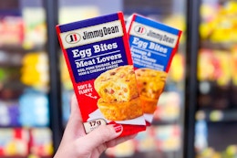 Two Jimmy Dean Egg Bites held up in frozen isle in stores at Walmart
