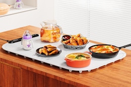 Food Warming Mat Drops to Only $17.99 After Amazon Discounts card image