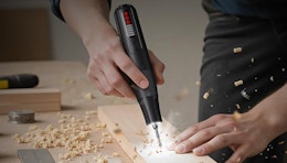 a person using a rotary tool 