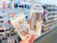 hand holding kitsch hair accessories in walgreens