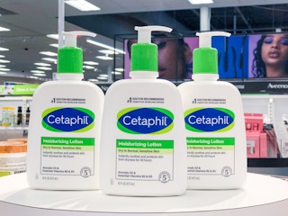 three bottles of cetaphil moisturizing lotion on shelf