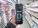 hand holding axe body wash in walgreens
