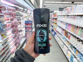 hand holding axe body wash in walgreens