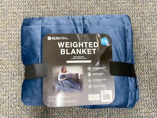 Altavida 12-Pound Ultra Plush Faux Mink Weighted Blanket on floor