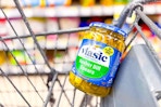 jar of vlasic pickles in a cart