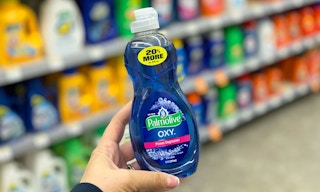 hand holding bottle of Palmolive dish soap