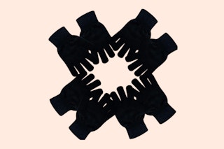 winter gloves on a peach background