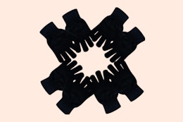 winter gloves on a peach background