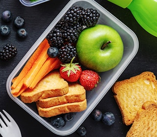an open food container with a lunch inside