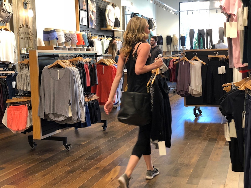 Woman shopping for Lululemon leggings