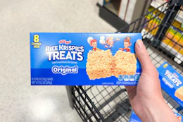 hand holding a box of kelloggs rice krispies treats