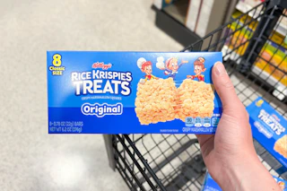 hand holding a box of kelloggs rice krispies treats
