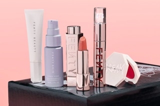 fenty beauty products with a pink background 