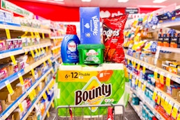 bounty paper towels, persil detergent, cascade dishwasher pods, kleenex, and doritos in an aisle