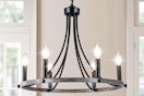 Lifestyle image of the rustic wagon wheel (farmhouse style) 6-light chandelier in home setting
