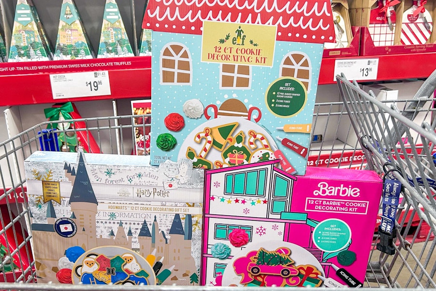 elf, barbie, and harry potter cookie kits in a cart