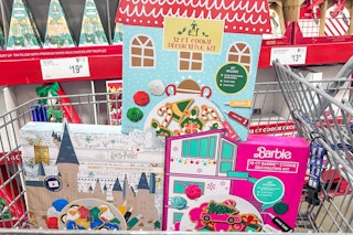elf, barbie, and harry potter cookie kits in a cart