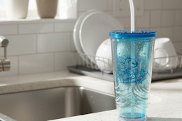 lilo and stitch tumbler by a kitchen sink
