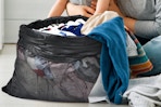 laundry falling out of mesh laundry bag