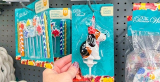 a person holding a pioneer woman candle