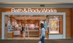 bath and body works entrance in mall with passersby