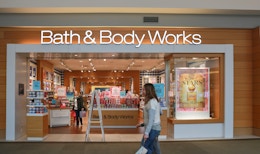 bath and body works entrance in mall with passersby