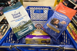 petsmart shopping cart with dog food in it