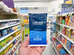 hand holding cottonelle wipes in walgreens