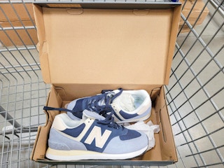new balance sneakers in a cart