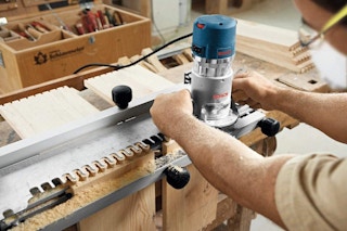 A Bosch router being used on wood.
