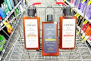 3 bottles of cremo shampoo in a cart
