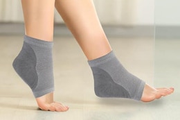 a woman wearing heels socks