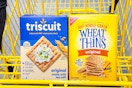 wheat thins and triscuit crackers in yellow shopping cart