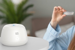 a retainer cleaner on a table