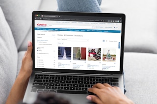 Someone shopping the Costco website for Christmas decor