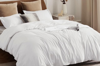 a made bed with the Bedsure Queen Duvet Cover with Shams