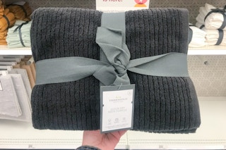 hand holding a threshold quick dry towel set at target