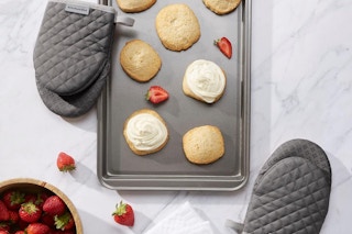 oven mitts near a pan