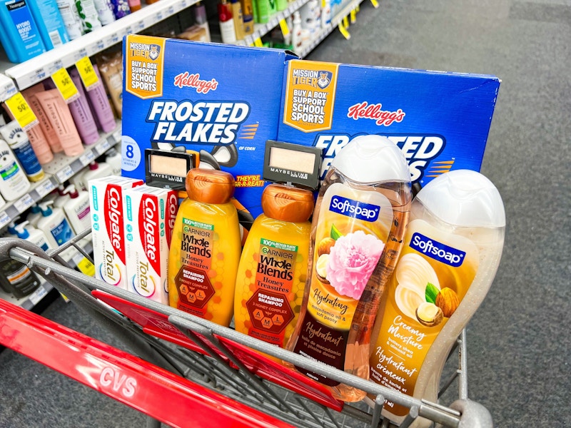 frosted flakes, toothpaste, eyeshadow, shampoo, and body wash in a cart